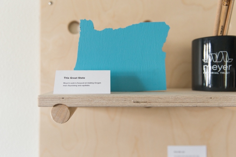 State of Oregon cut out standing on a shelf.