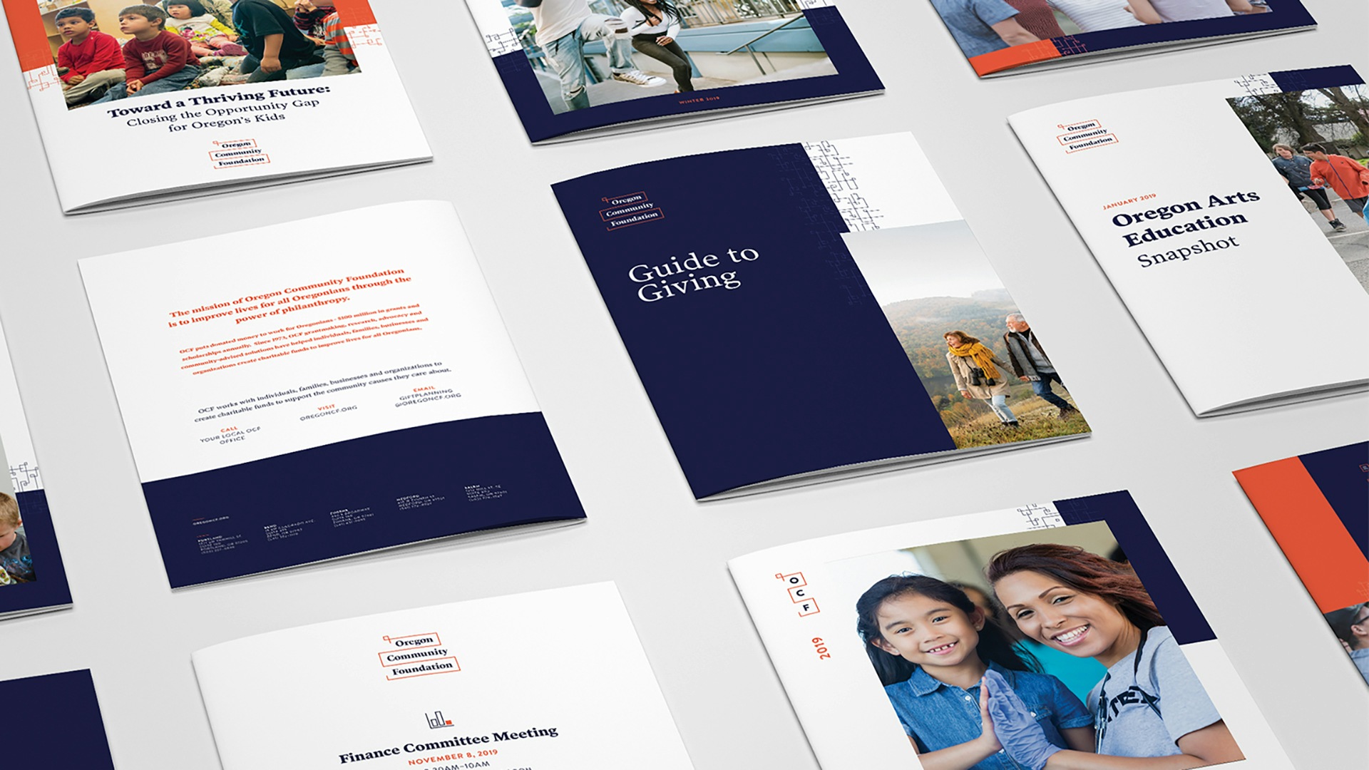 Samples of Oregon Community Foundation print marketing laid out on a table