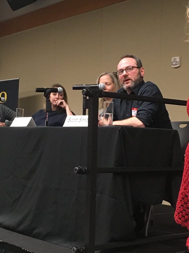 Scott Smith speaking at a conference.