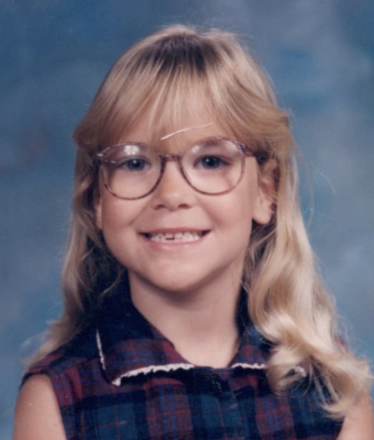Headshot of Robyn Baker as a small girl.