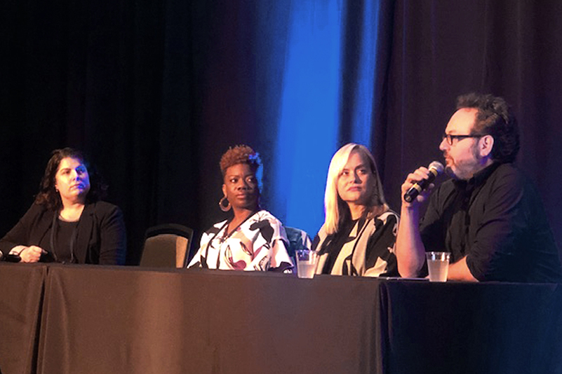 Scott Smith speaking at a conference.