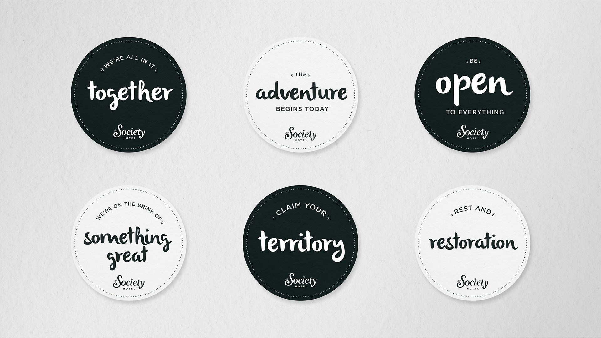 The Society Hotel round placards.