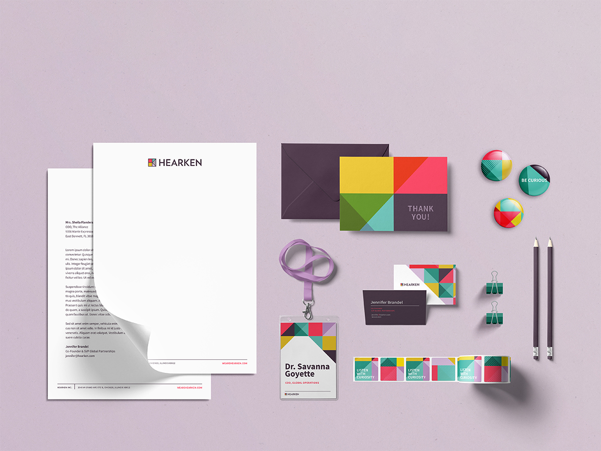 a variety of branded materials we designed for Hearken, from letterhead, to greeting cards, to stickers.