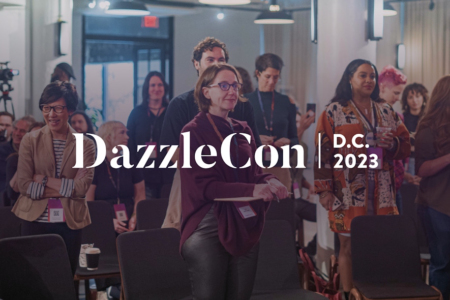 Attendees of Dazzlecon 23 with the secondary logo overlaid on top.  topm 