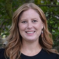 A headshot of Lauren Booth, Executive Director of Oregon Well-Being Trust